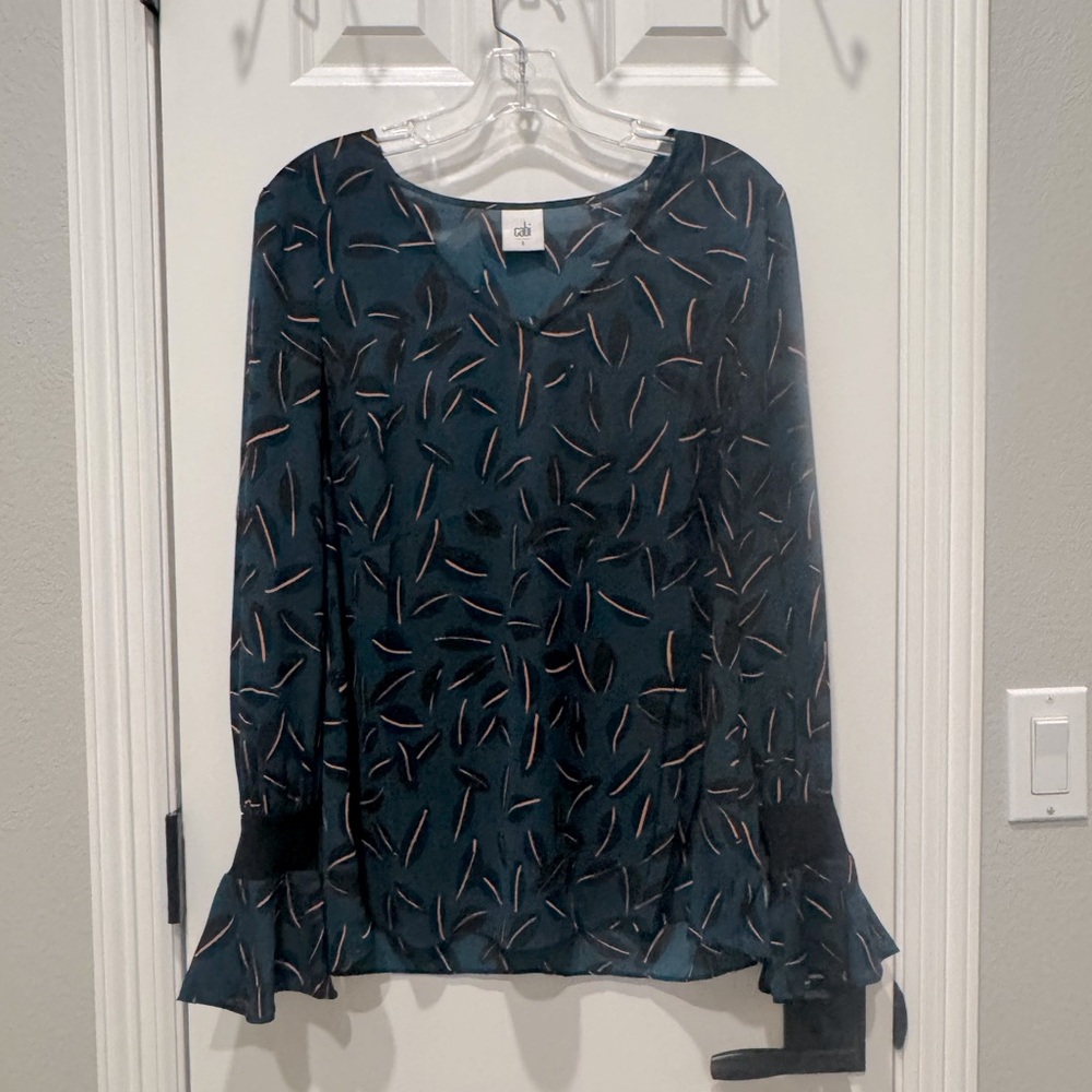 Long sleeve, bells out after the black cuff